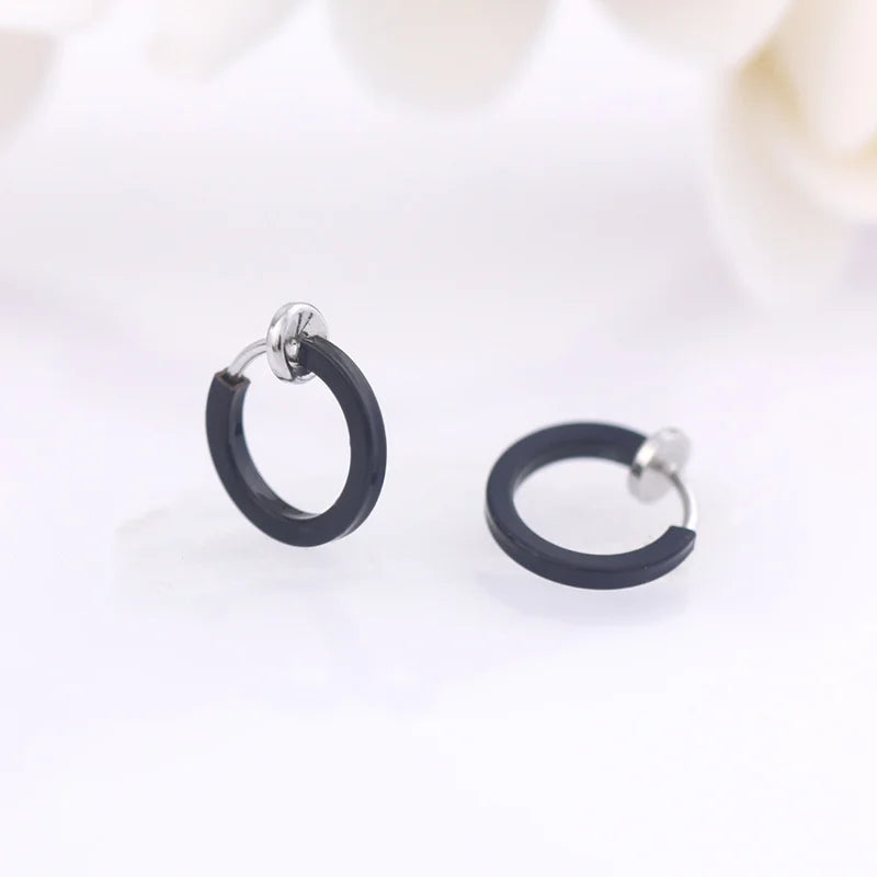 Close-up of Black Mini Square Tube Clip-On Hoop Earrings showcasing the edgy and sleek black enamel plating.