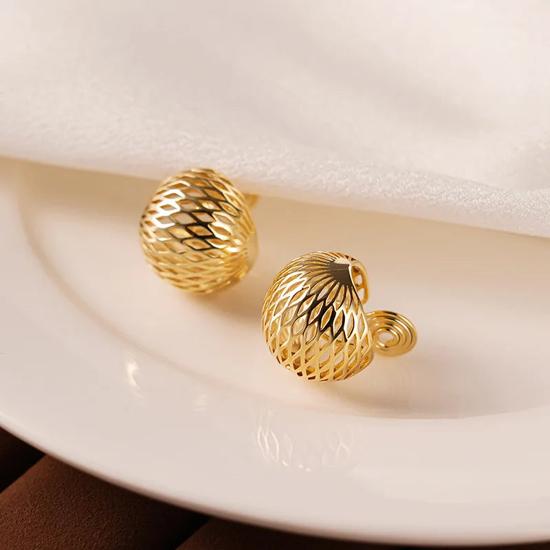 Close-up detail of the diamond mesh texture on the Diamond Mesh Clip-On Hoop Earrings, showcasing their intricate craftsmanship.