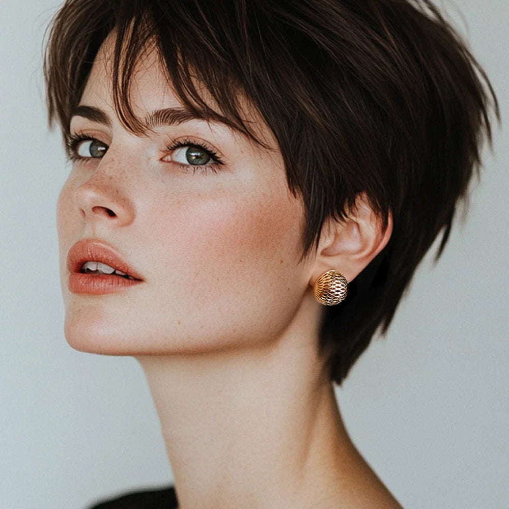 Diamond Mesh Clip-On Hoop Earrings worn by a model, highlighting their bold size and elegant design.