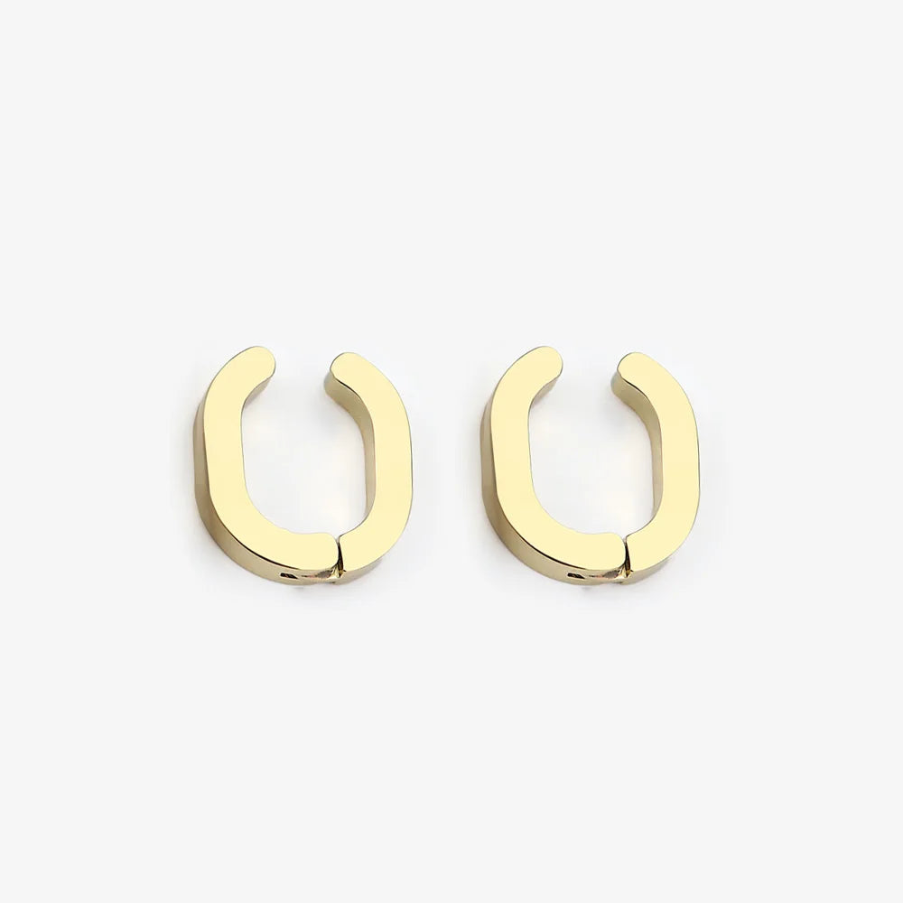 Pair of Gold Horseshoe Clip-On Hoop Earrings displayed on a white background.