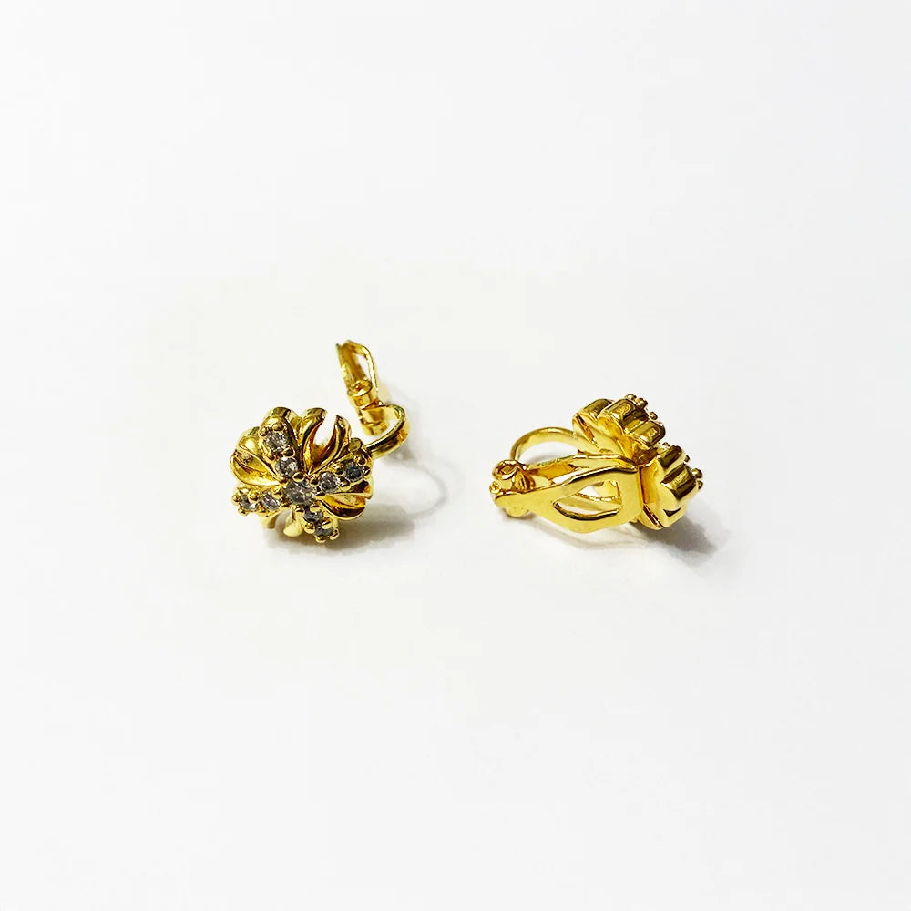 Boucles d'oreilles à clip en forme de croix en or