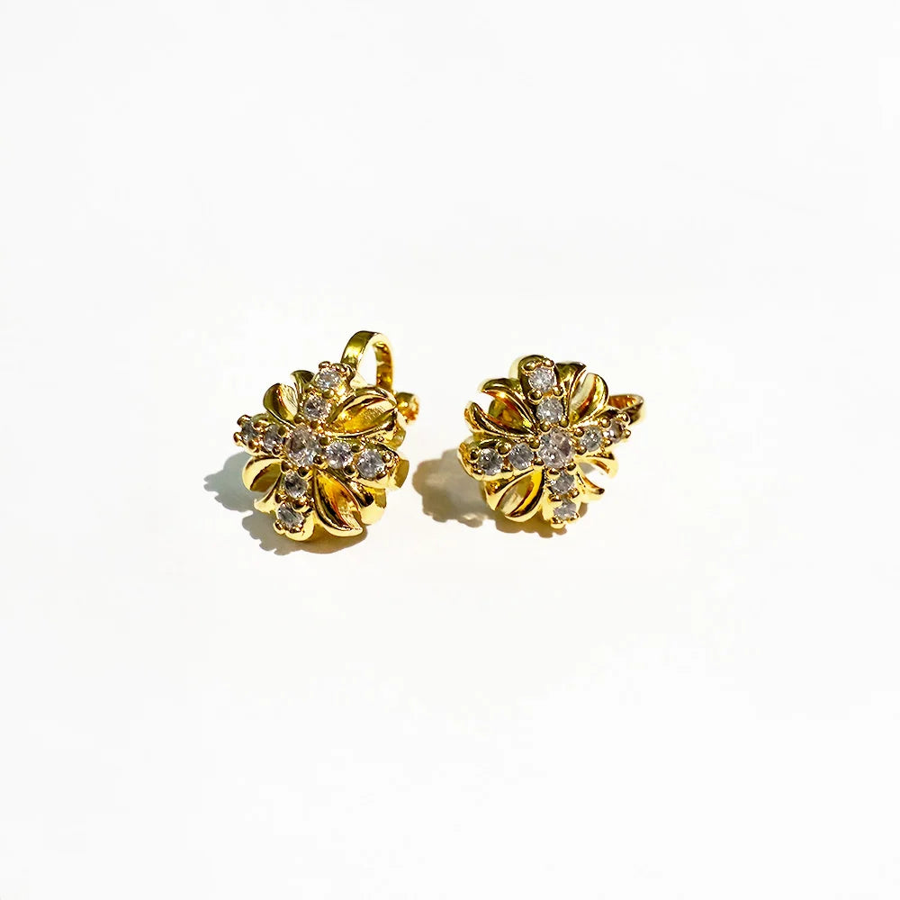 Boucles d'oreilles à clip en forme de croix en or