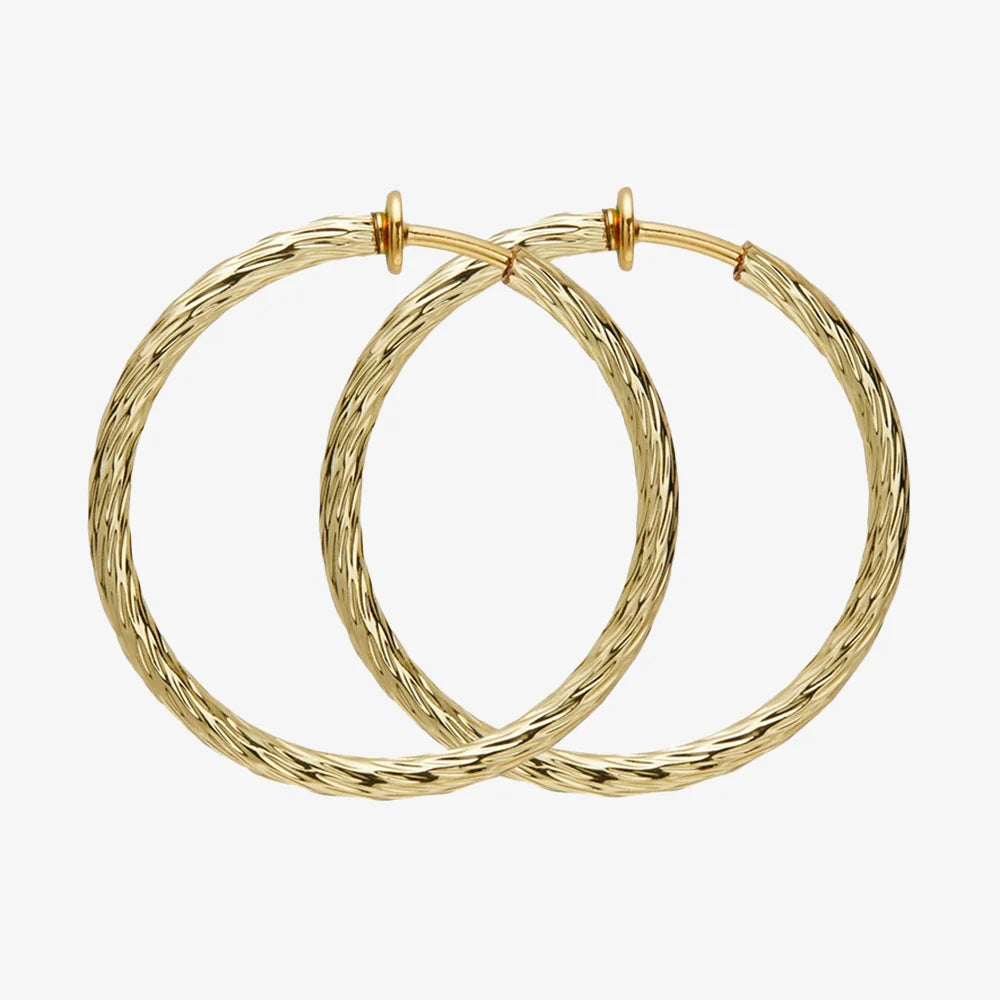 Grote, gedraaide, getextureerde clip-on oorbellen in goud