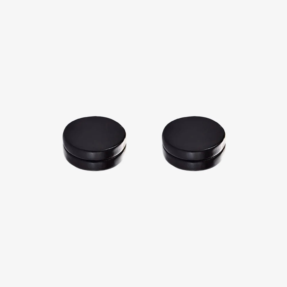 A pair of matte black round magnetic stud earrings for men, shown on a clean, white background.