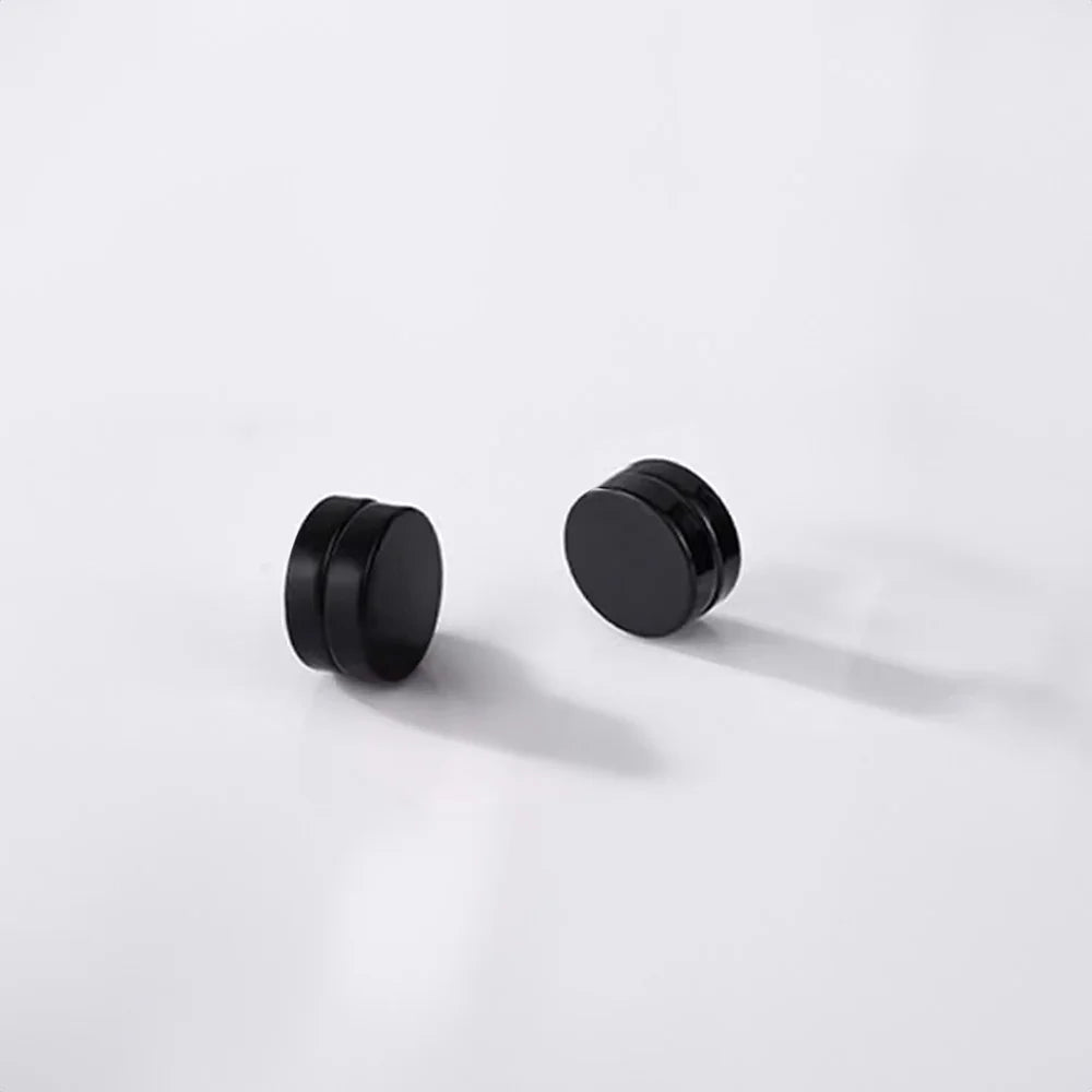 Matte black magnetic non-pierce ear studs for men, a comfortable and stylish alternative to traditional earrings.