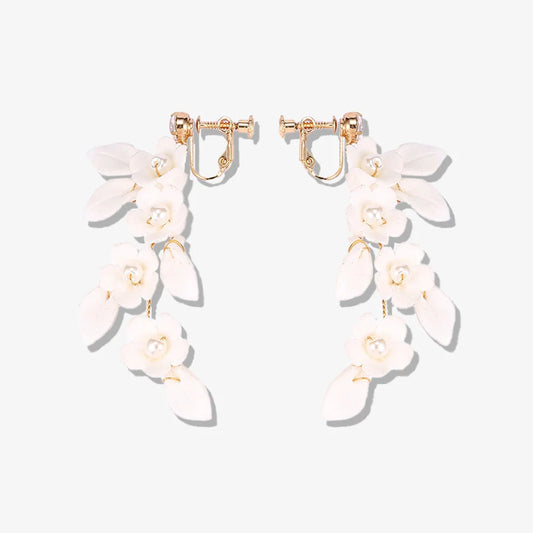 Petal Pearl Cascade Screw Back Clip-On Earrings with light ceramic floral design and faux pearls for weddings.