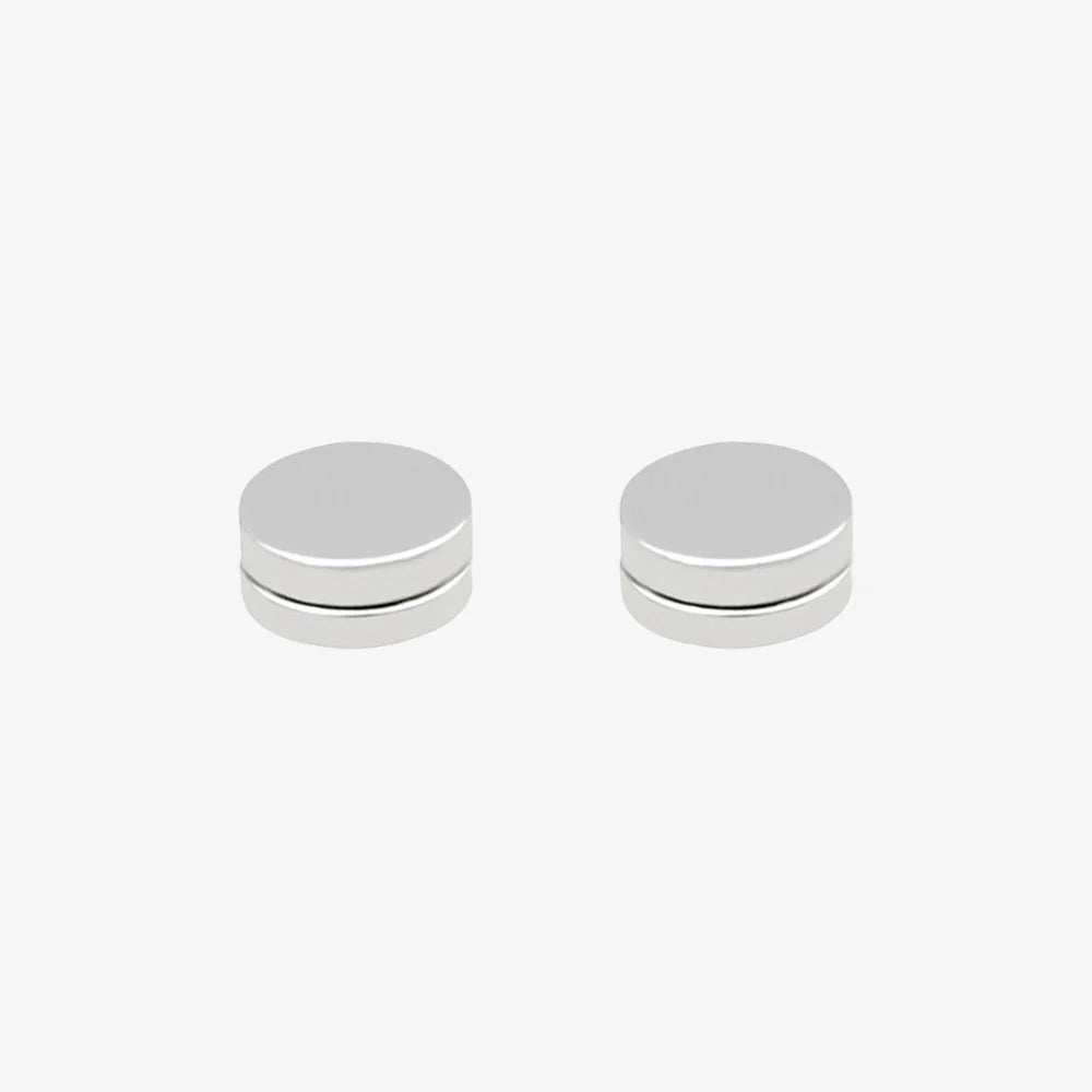 Pair of matte silver round magnetic ear studs for men, crafted from durable stainless steel.