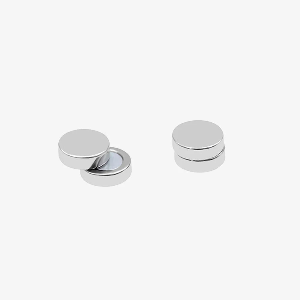 Matte silver round magnetic stud earrings made of hypoallergenic stainless steel.