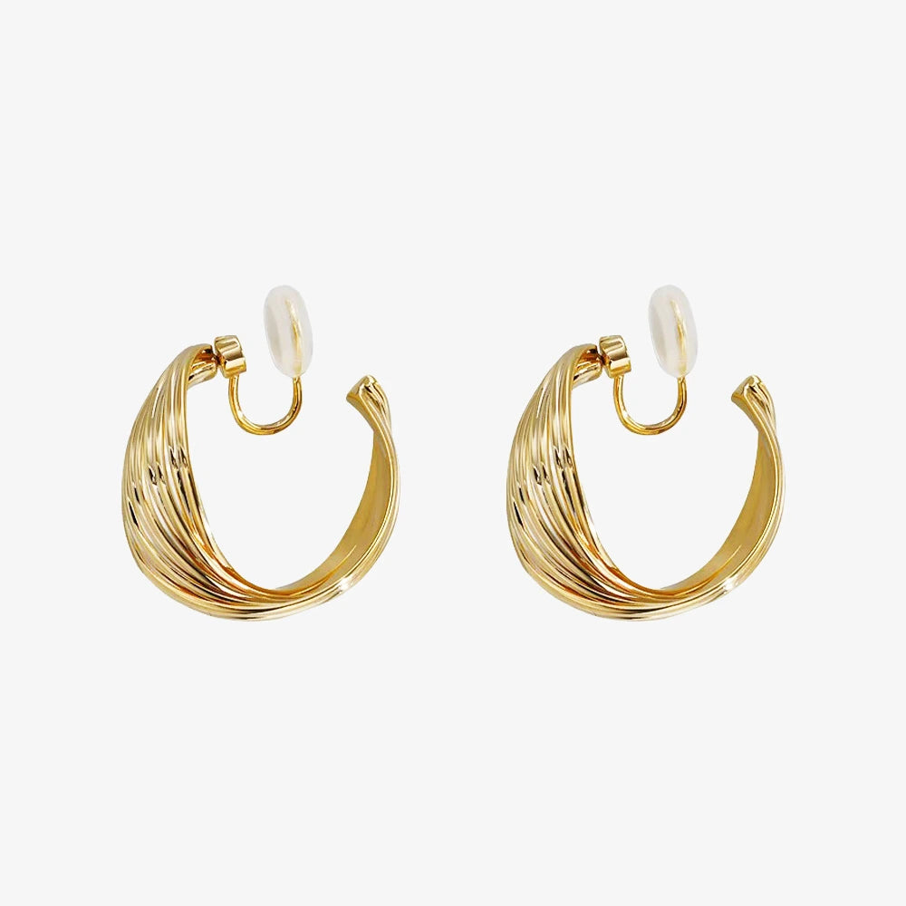 Front view of Rotating Spiral Clip-On Hoop Earrings in Gold showcasing the multiple string twist design.