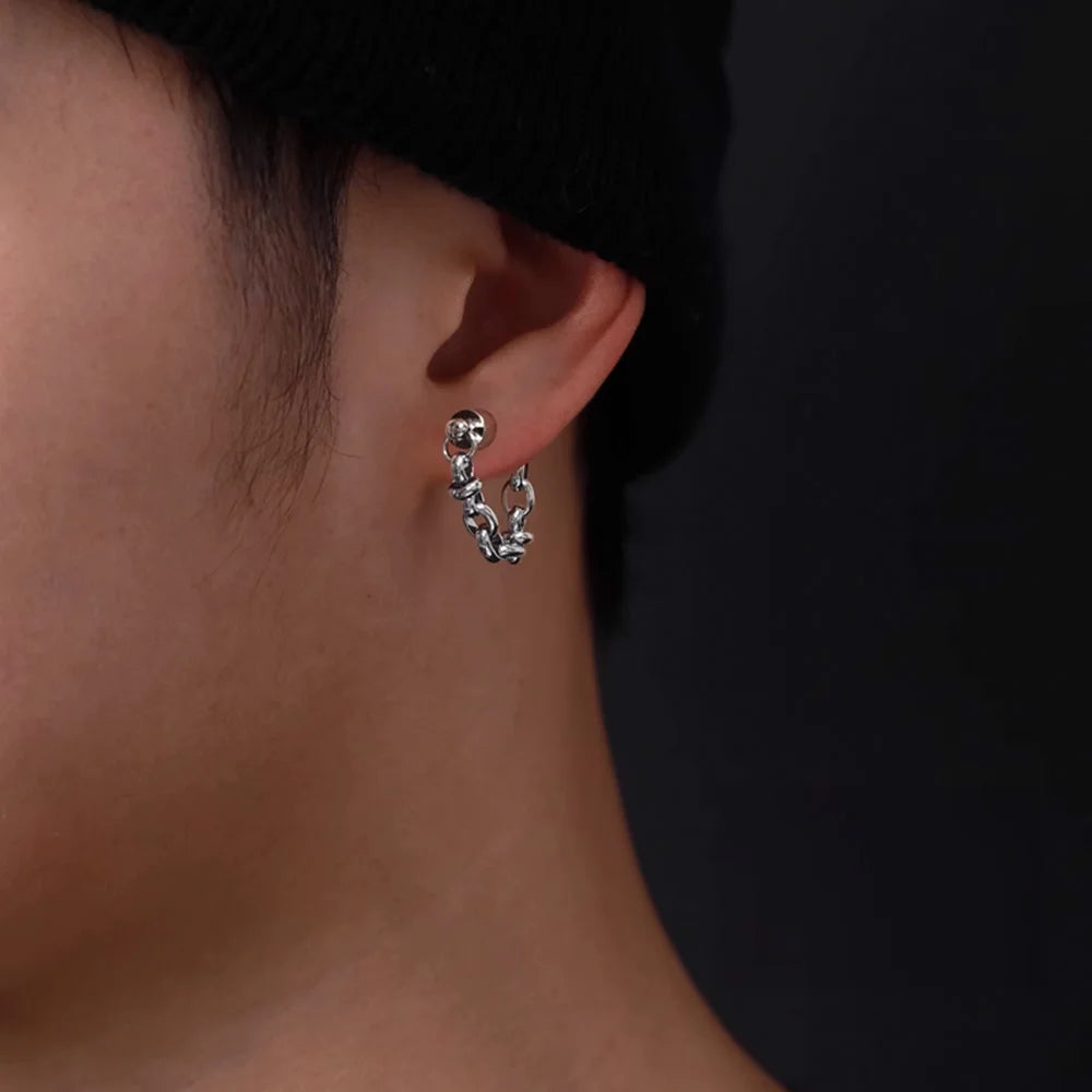 Model wearing silver magnetic hoop earrings, perfect for polished style.