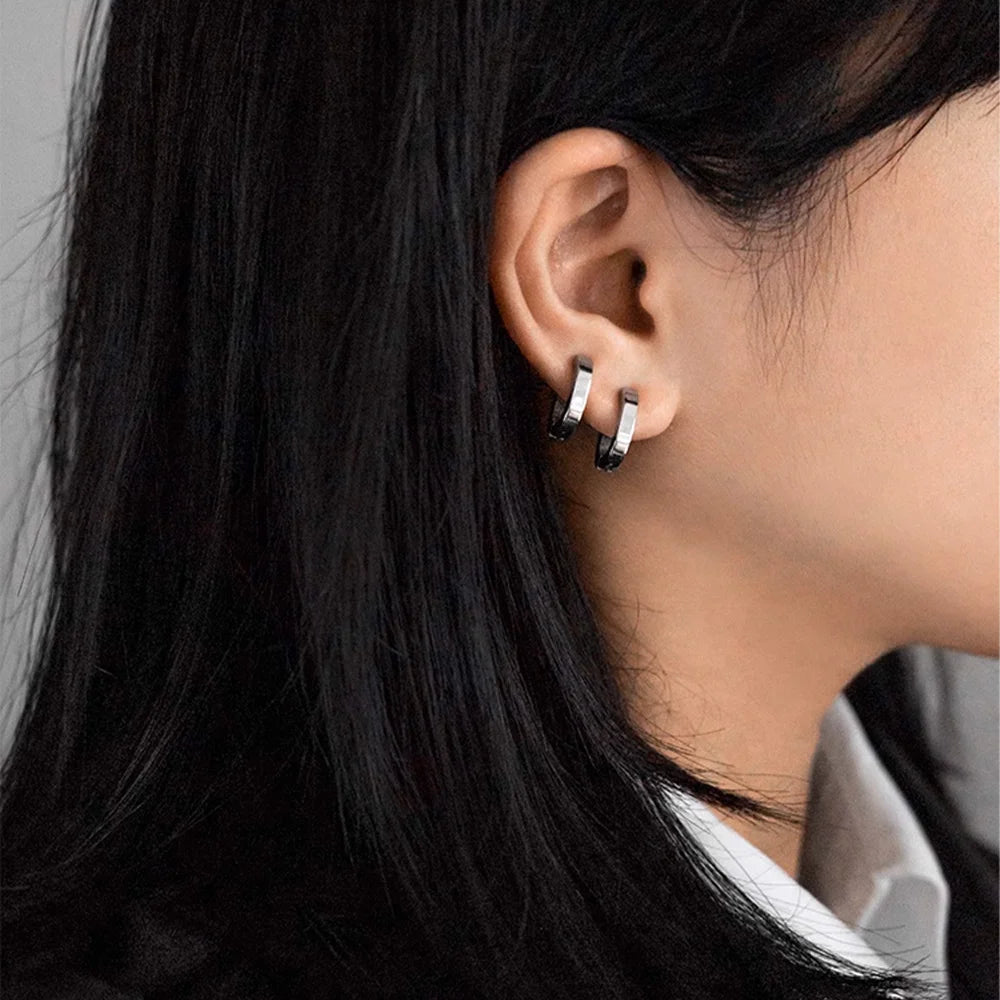 Model wearing Silver Horseshoe Clip-On Hoop Earrings, double clips.