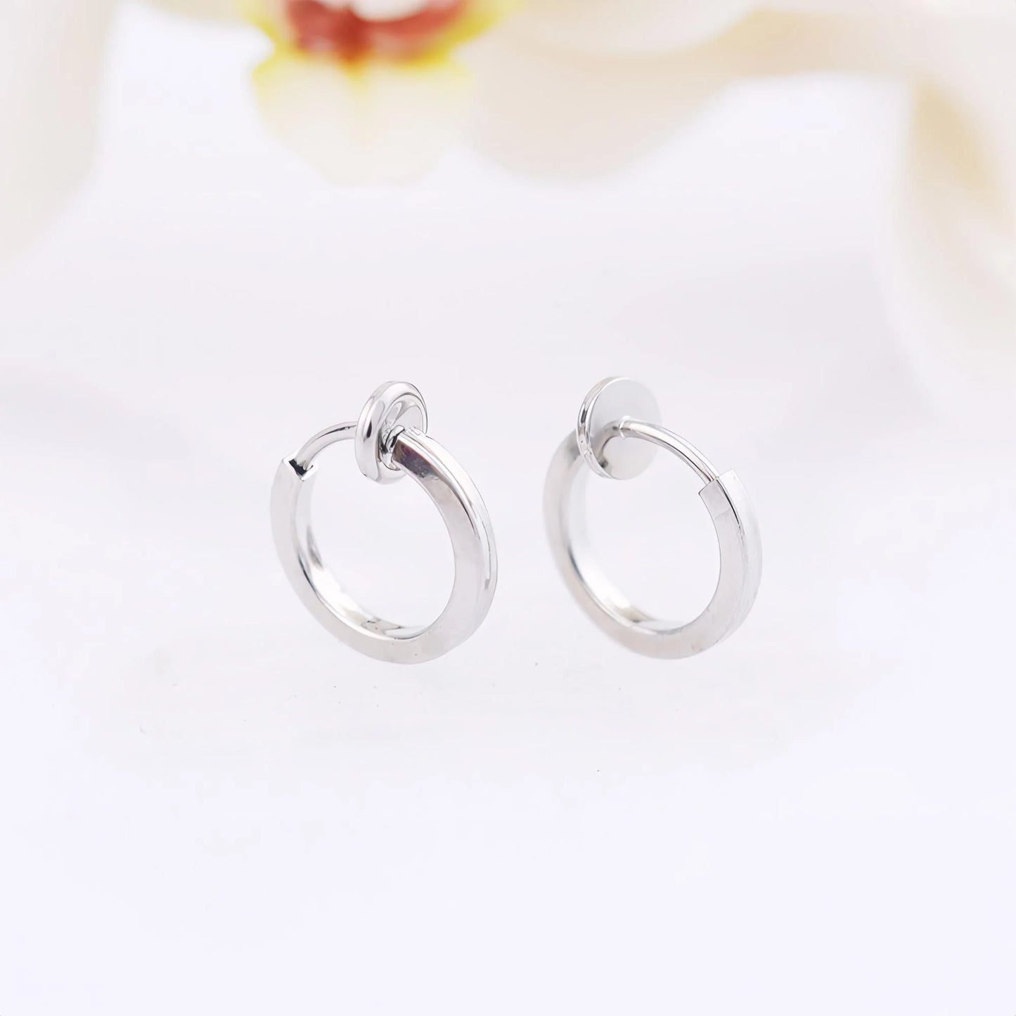 Lightweight and stylish Silver Mini Clip-On Hoop Earrings for men, available in 13mm and 15mm diameter options.