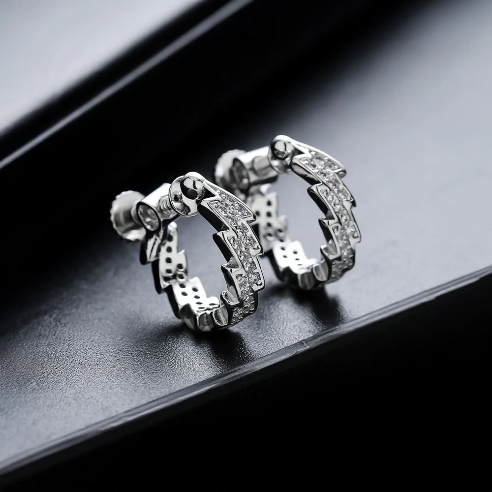 Silver screw back earrings featuring a sharp spike design