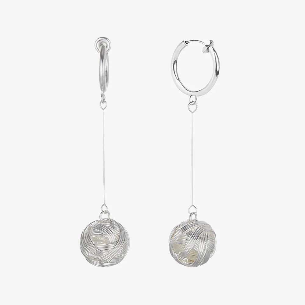 Silver Wire Orb Drop Clip-On Earrings displayed on a white background.