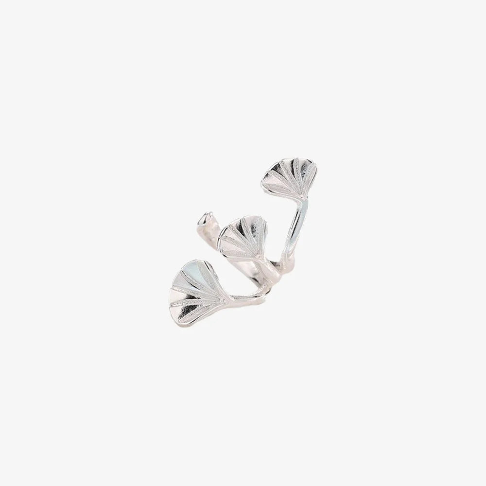 This elegant Silvery Ginkgo Leaf Ear Cuff adds a touch of nature-inspired beauty to your ear.