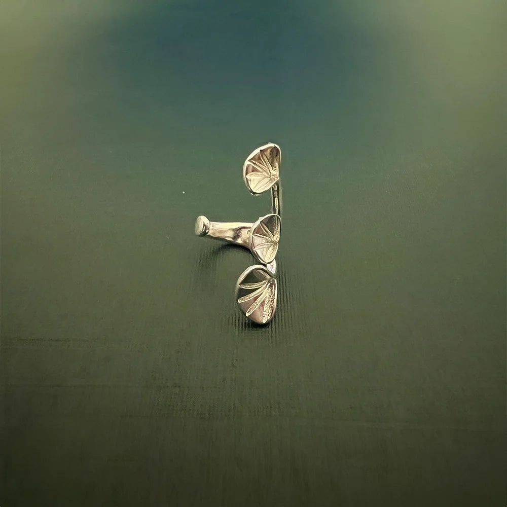 The delicate ginkgo leaf design adds a unique and sophisticated element to your jewelry collection.