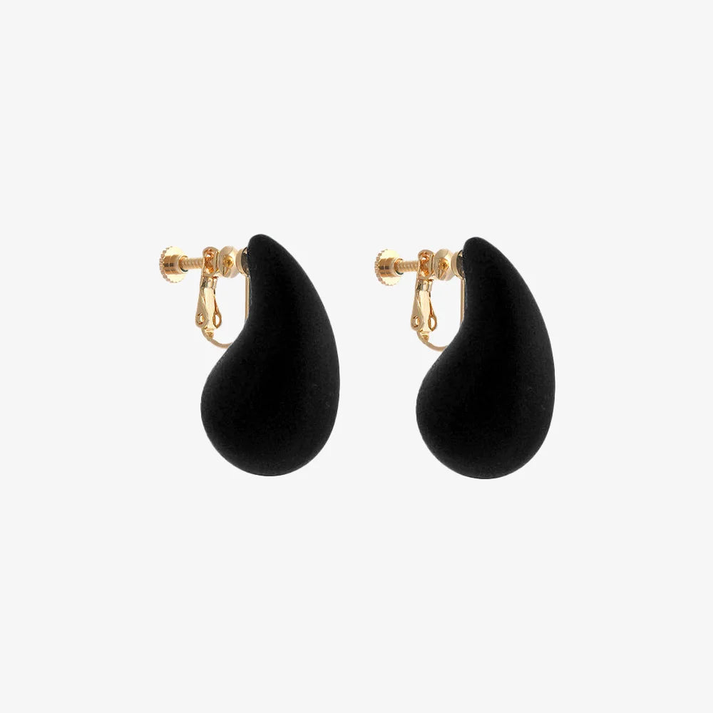Detailed view of Teardrop Screw Back Clip-On Earring in Black, highlighting the sleek and elegant finish