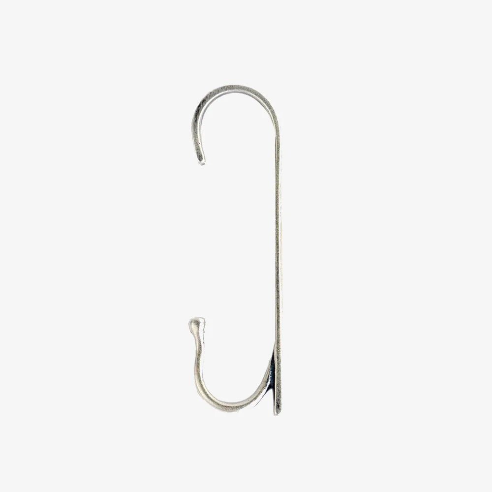 Studio product shot of the Axis sterling silver minimalist wrap ear cuff on a clean white background.