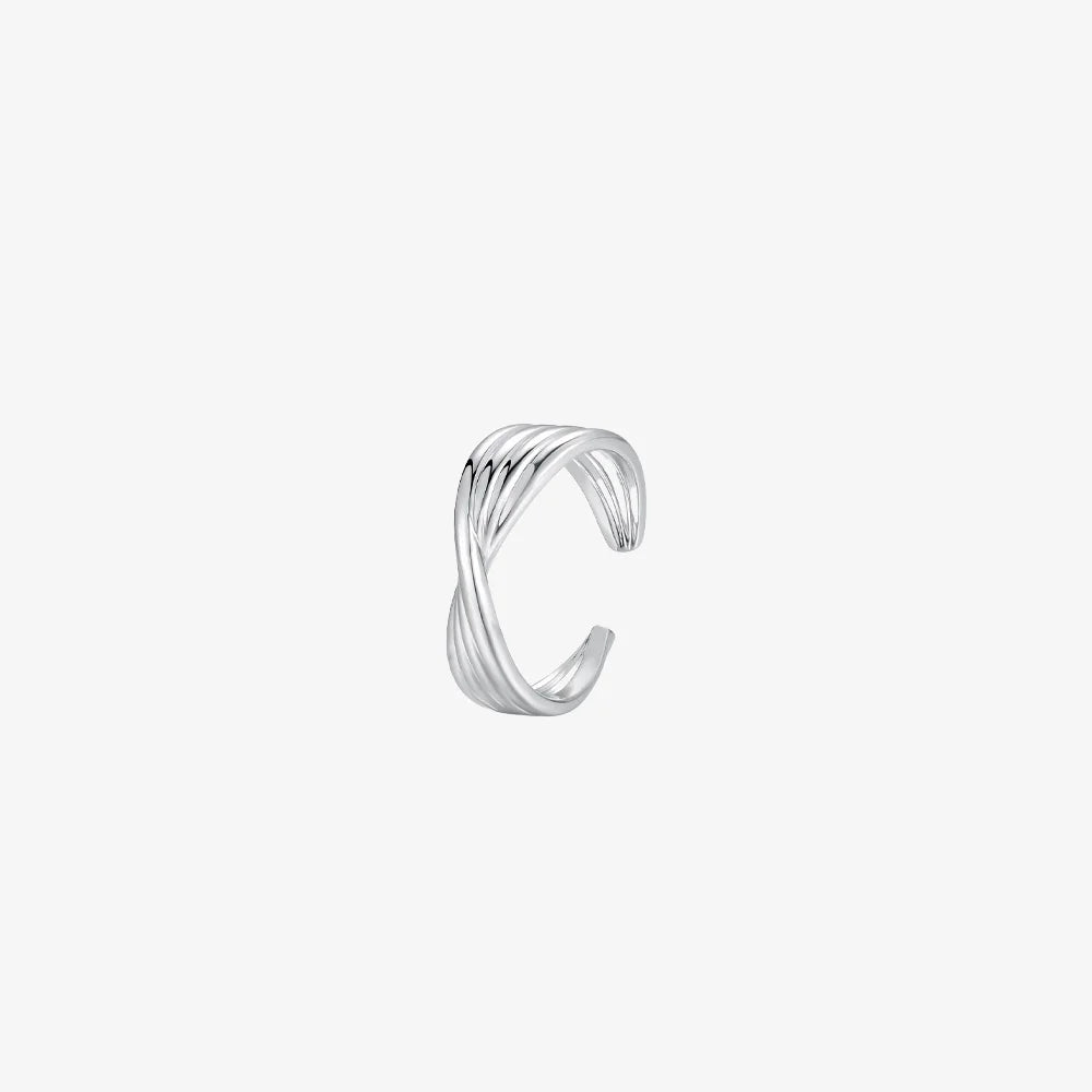 A single sterling silver ear cuff with a twisted, crossover multi-band design, shown on a clean white background.