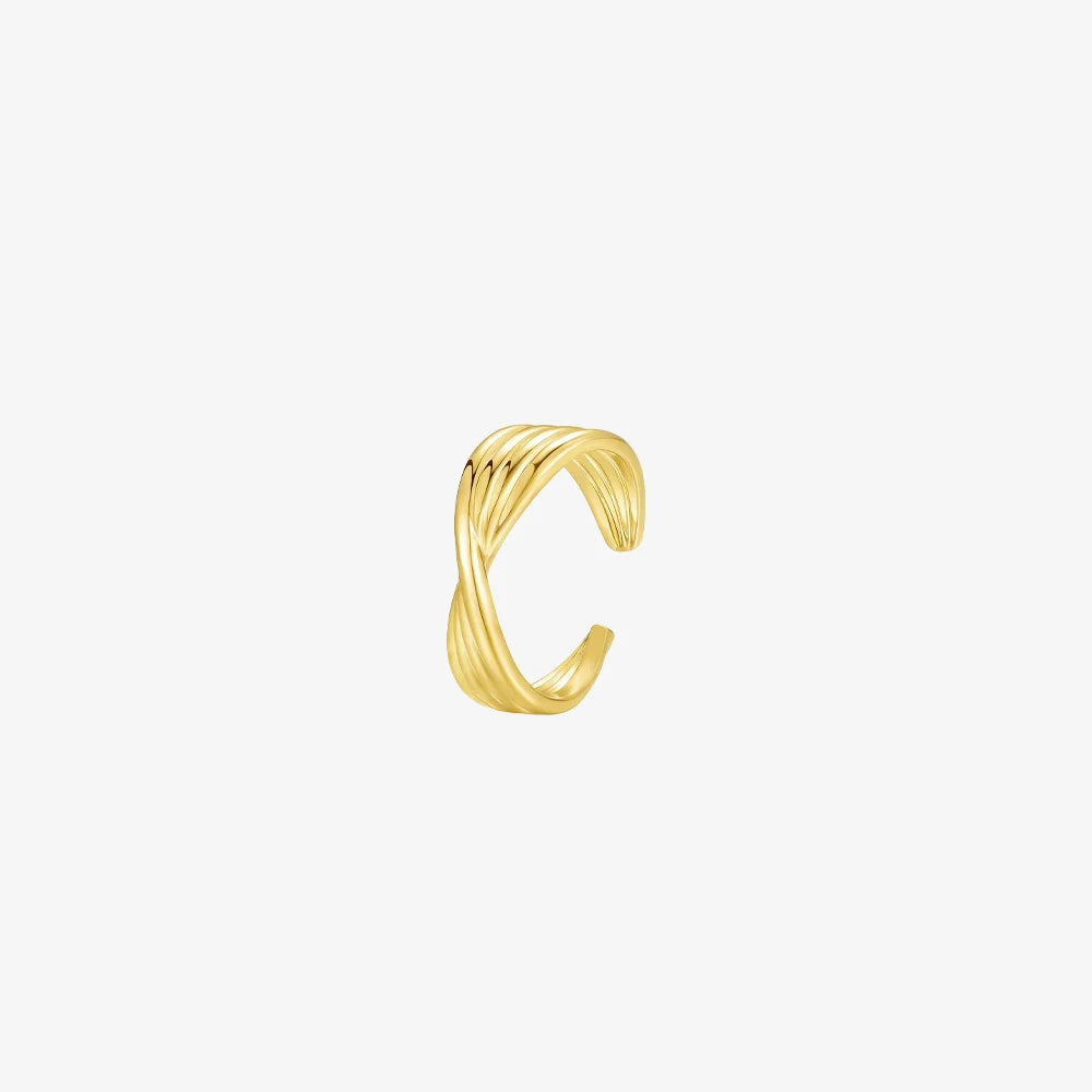 A single gold ear cuff with a twisted, crossover multi-band design, shown on a white background.