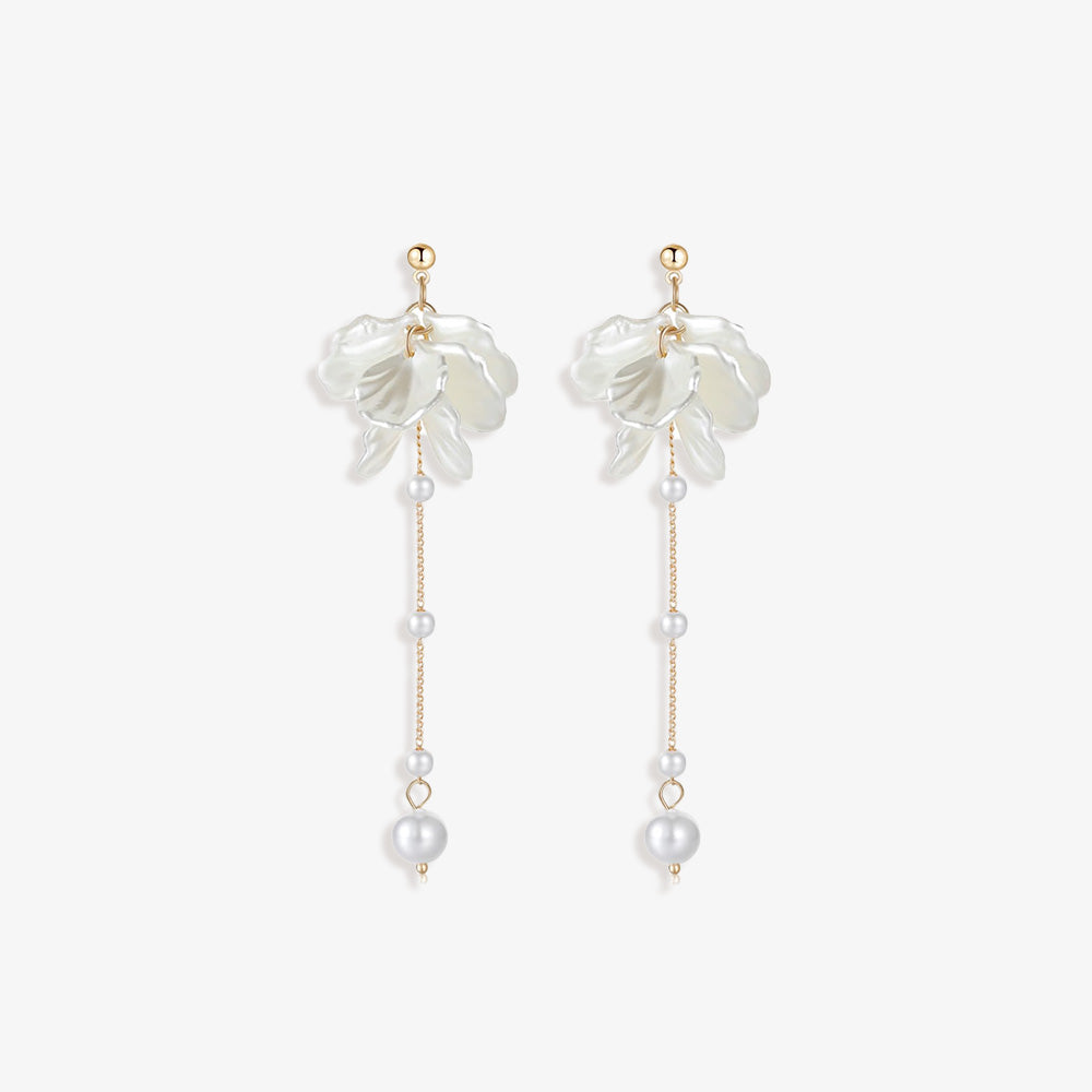 The Floral Pearl Clip Earrings blend classic charm with contemporary style. Featuring white faux pearls dangling from a gold-tone alloy chain linked to a sculpted flower, they’re perfect for garden parties and spring events. The screw-back clip-on mechanism offers secure and comfortable wear.