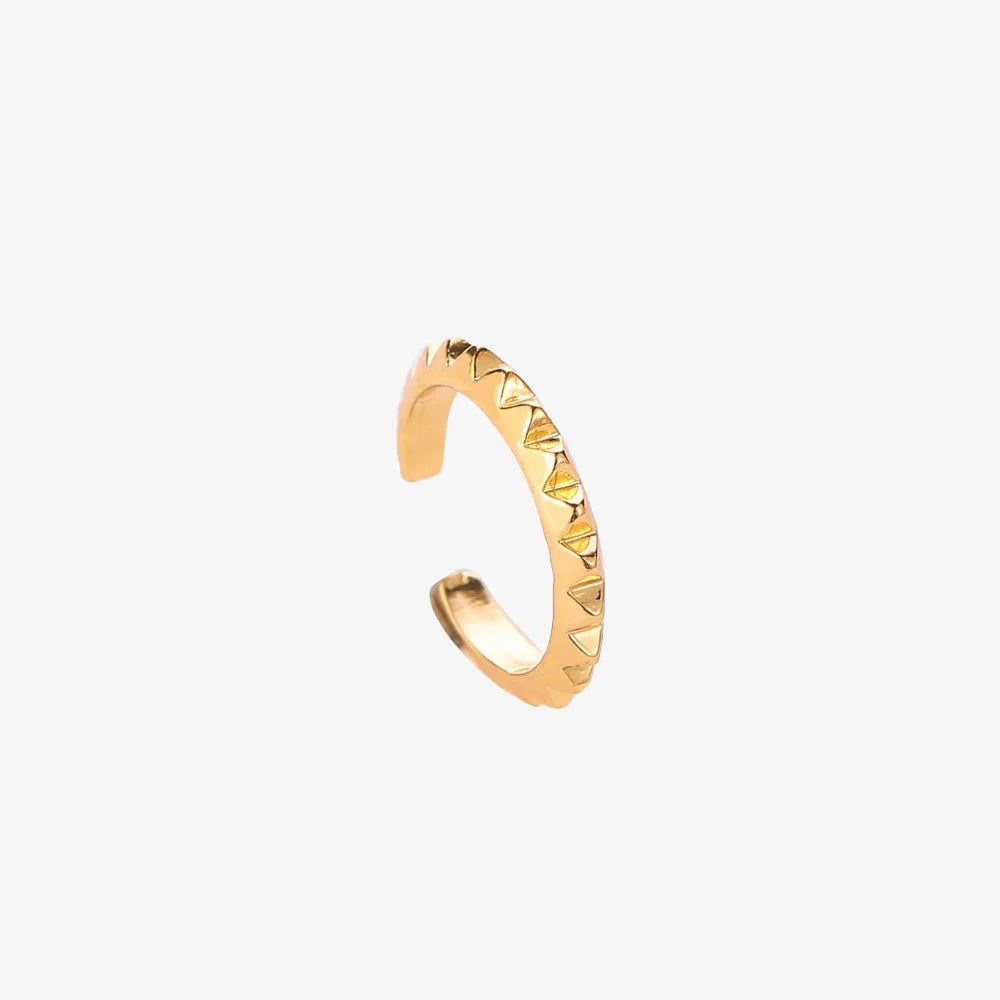 A single gold studded ear cuff made from 14k gold finished sterling silver, shown isolated on a white background.