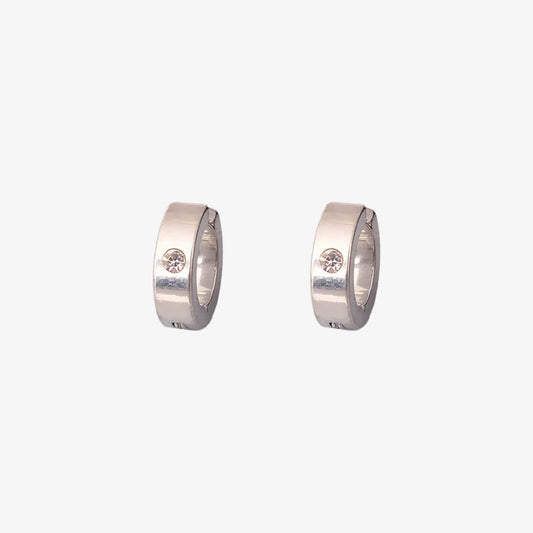 A pair of minimalist men's clip-on hoop earrings in silver with a single inset cubic zirconia stone, shown isolated on a white background.