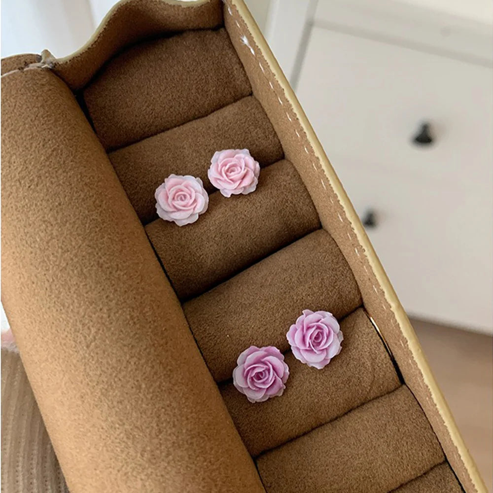 Pink and lavender rose magnetic stud earrings in display box