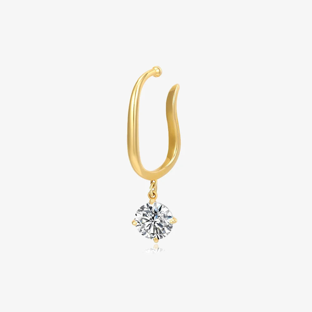 A single gold U-shaped ear cuff with a dangling, round, brilliant-cut crystal charm, shown on a white background.