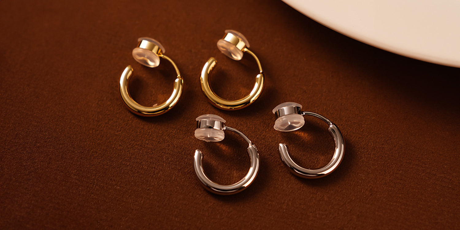 Woman with these chunky gold curved hoop clip-on earrings. Screw-back closure ensures a comfortable fit for non-pierced ears. 