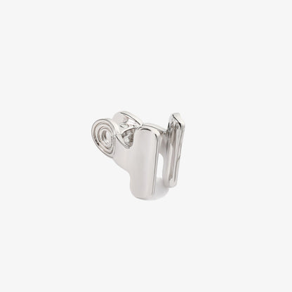 Close-up of the silver Bull Clip Charm Helix Ear Cuff, embodying an artistic take on a commonplace item, ideal for those who appreciate a touch of whimsy in their special event attire.