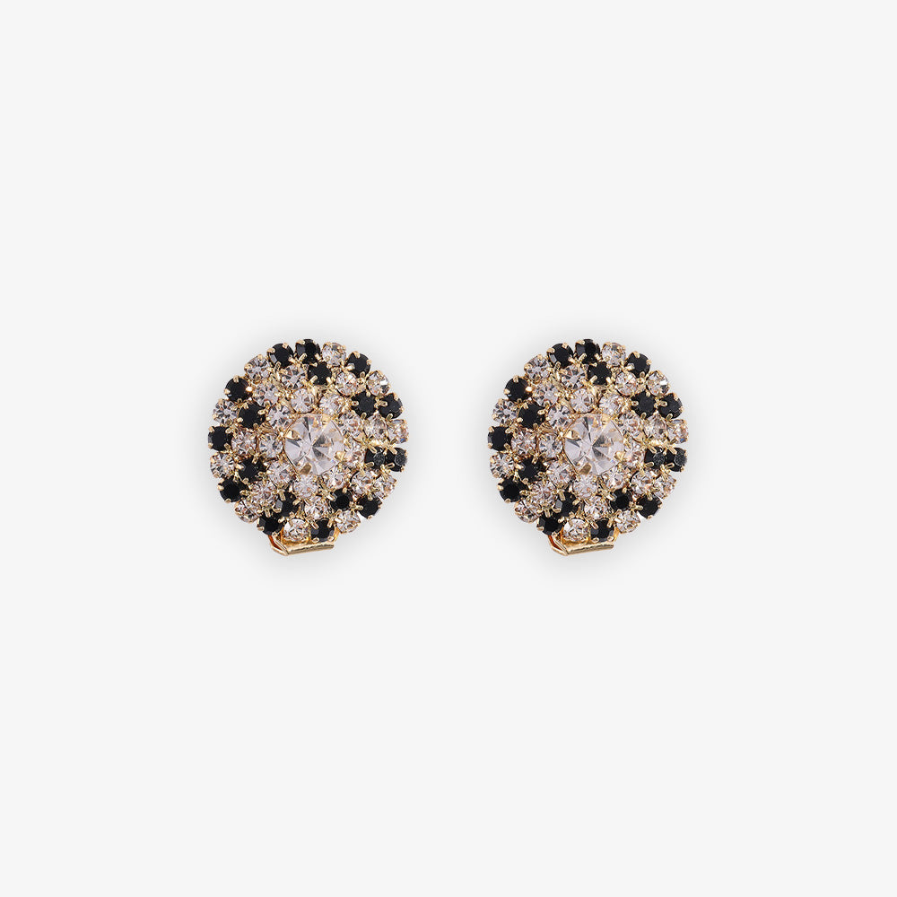 These earrings feature a round design adorned with sparkling rhinestones, creating a stunning starburst effect.