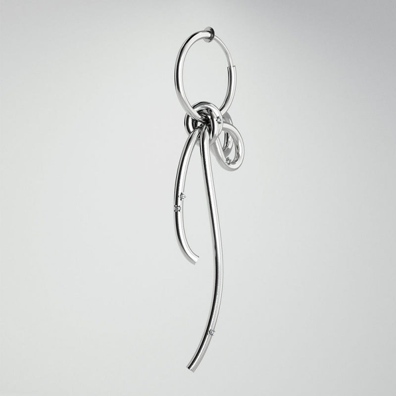 Sophisticated silver-toned alloy ribbon drop earrings featuring a slide-spring clip-on closure for non-pierced ears. These earrings marry classic elegance with contemporary flair, making them suitable for weddings, formal events, or as a special gift. The cascading ribbon silhouette adds a touch of graceful movement.