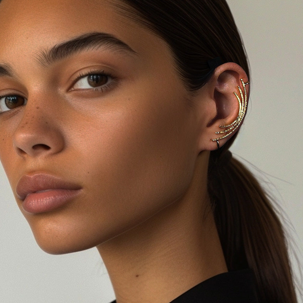 Woman showcasing Gold Linear Contour Ear Climber, perfect for a sophisticated date look or to make a statement at social gatherings, non-piercing fit.