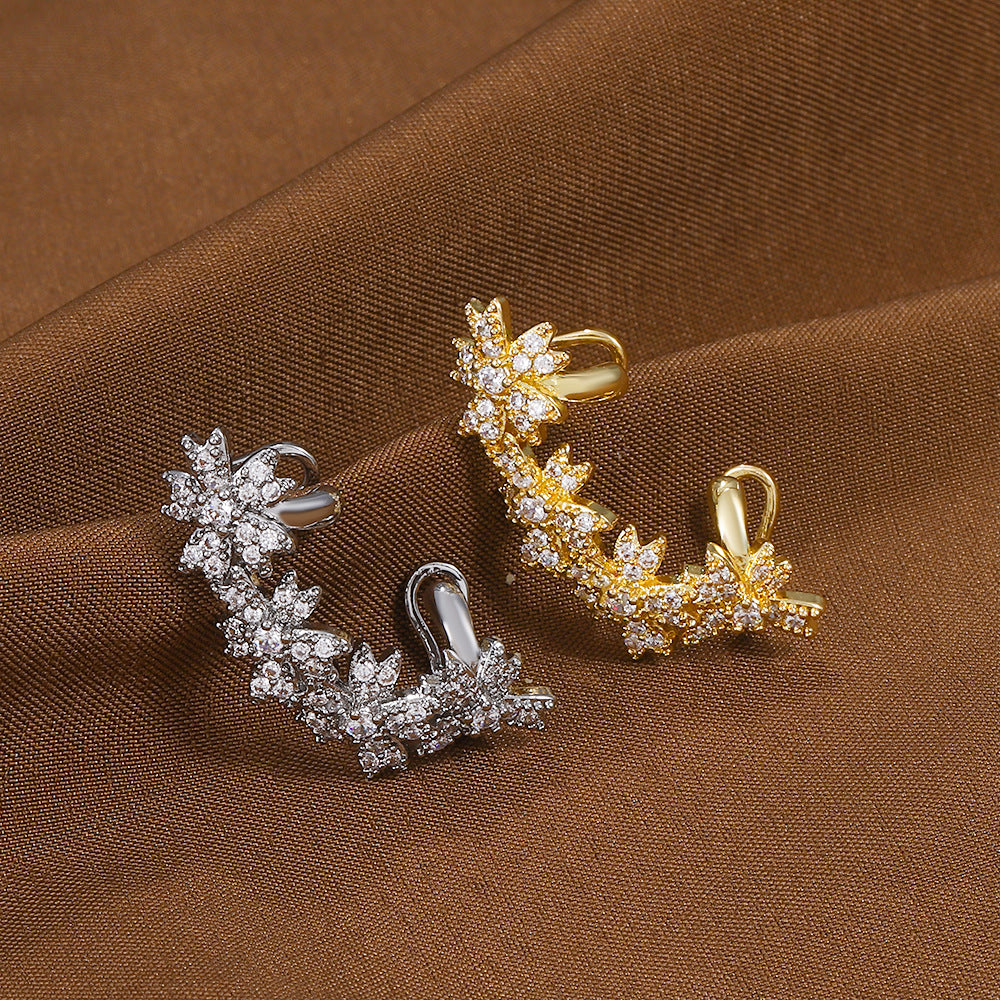 Warm gold and white gold Blossom Flower Crystal Helix Ear Cuffs, highlighting the detailed floral design and sparkling zircon gems, perfect for wedding elegance.