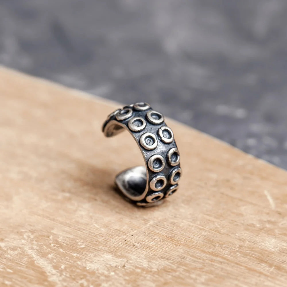 Sterling Silver Antique Octopus Tentacle Ear Cuff highlighting the masculine design.