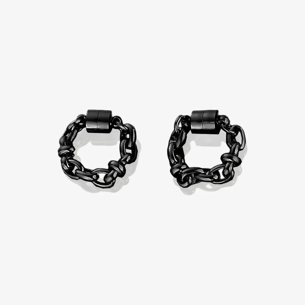 A pair of black magnetic hoop earrings made from titanium steel.