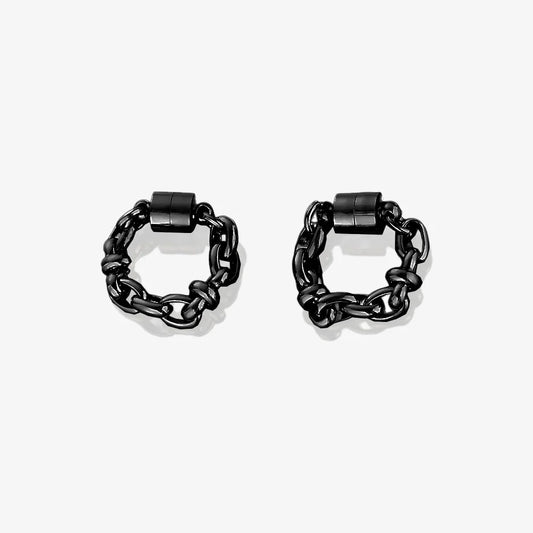 A pair of black magnetic hoop earrings made from titanium steel.