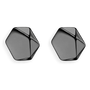 A pair of black hexagonal geometric stud earrings with a glossy, faceted finish, displayed on a clean white background.
