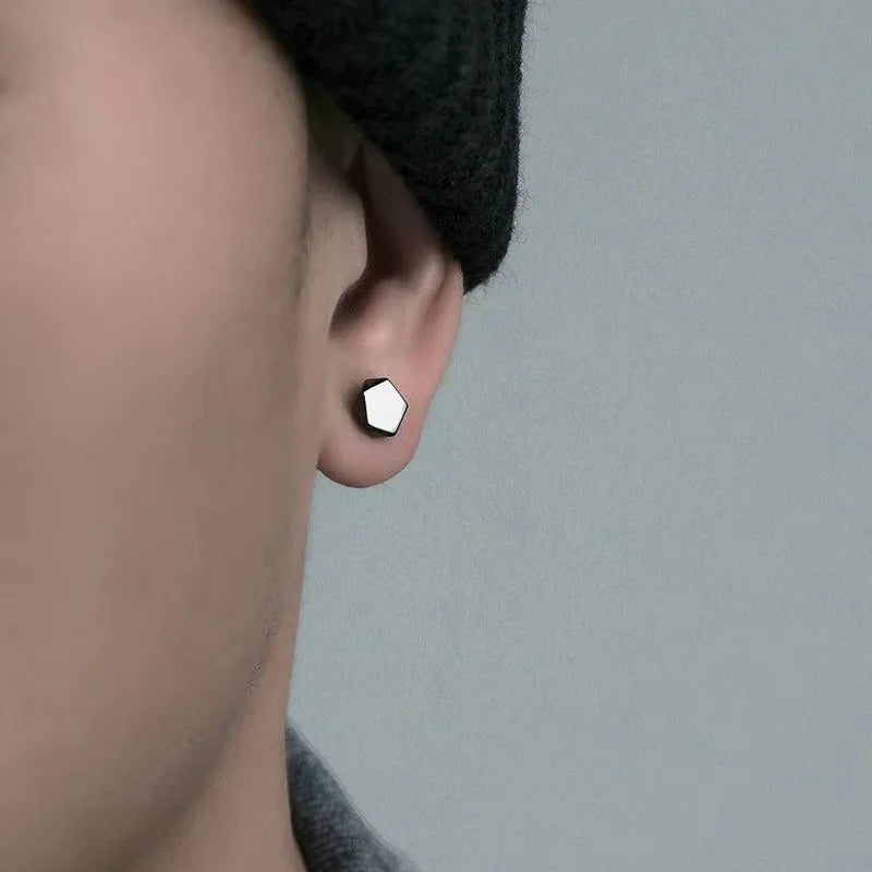 Polygon Magnetic Stud Earrings in Black side view on ear with white background