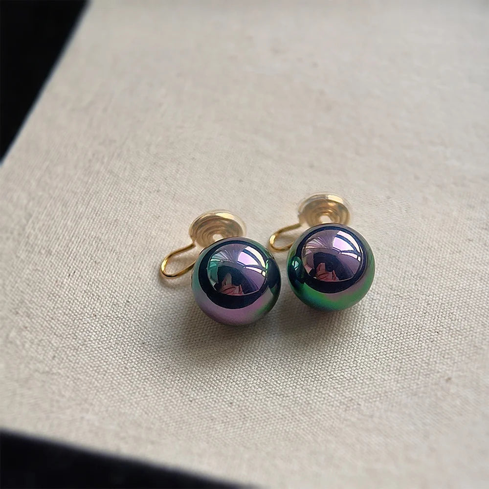 Detailed view of one Black Pearl Clip-On Earring, highlighting the lustrous black pearl and secure U-type clip-on closure.