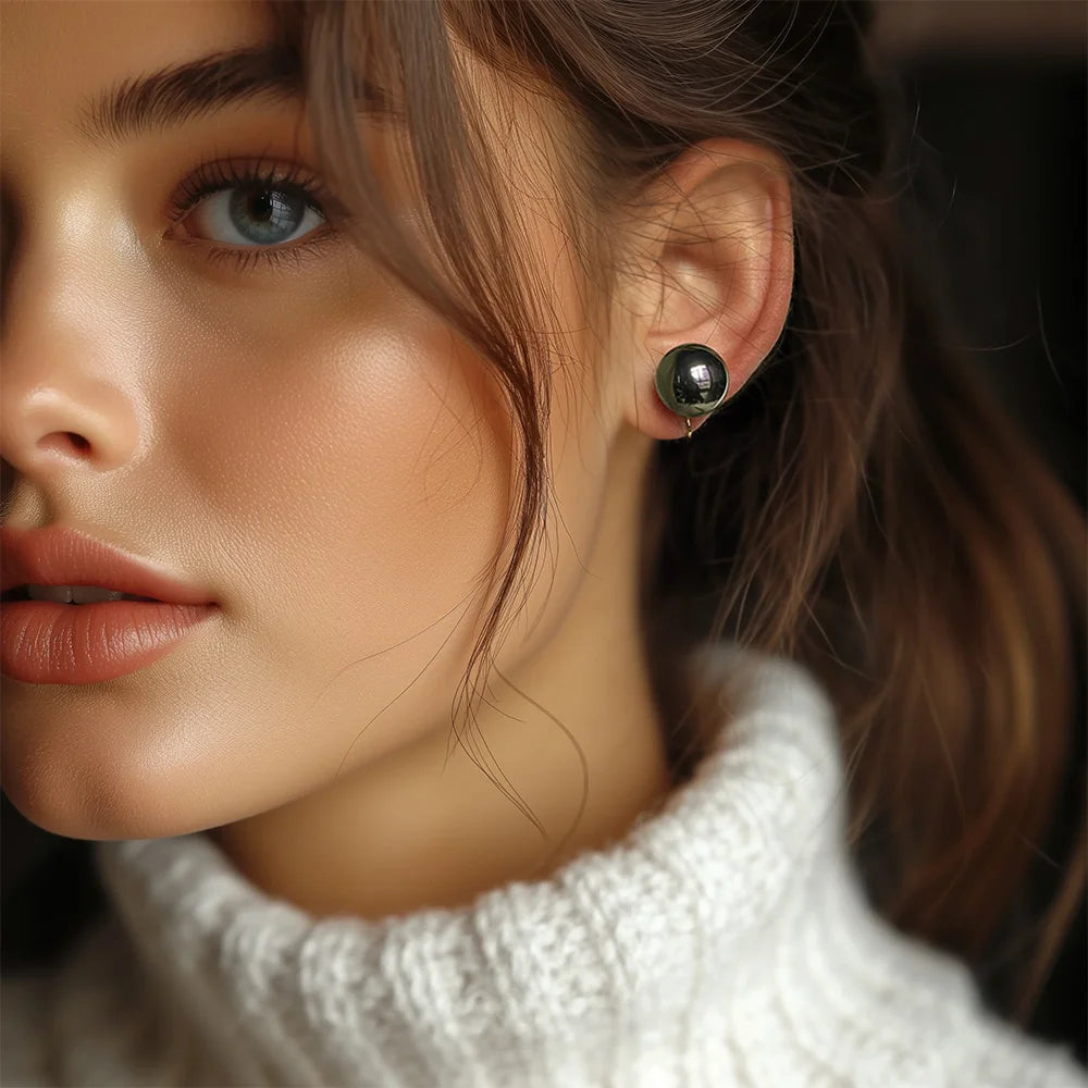 Model wearing the Black Pearl Clip-On Earrings, demonstrating the secure and comfortable fit of the U-type clip-on closures and the elegant appearance.