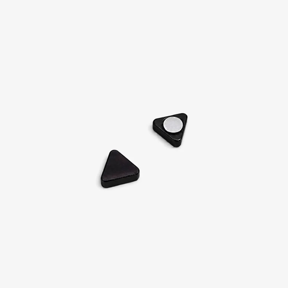 Black triangle magnetic stud earrings displayed on white surface, showing front and back angles