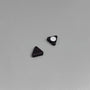 Black triangle magnetic stud earrings displayed on white surface, showing front and back angles