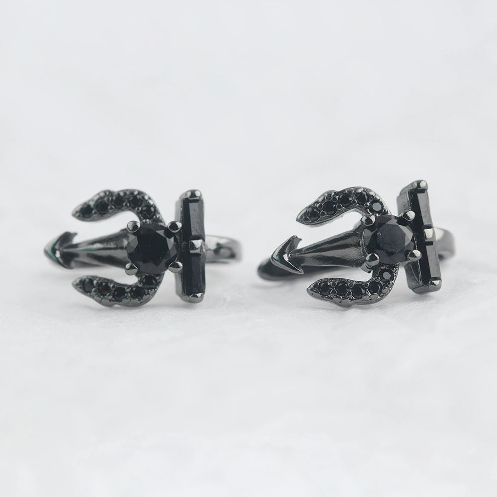 Black Trident Clip-On Ear Cuff pair displayed front view on white background, gunmetal finish