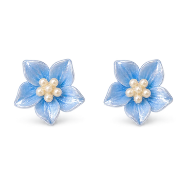 A pair of light blue flower-shaped stud magnetic earrings with white faux pearl centers, shown on a clean white background.