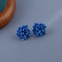 Blue Bloom Floral Clip-On Earrings displayed front view on white background with wooden bowl detail