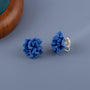 Blue Bloom Floral Clip-On Earrings displayed on gray background showing detailed flower design and gold-tone hardware