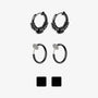 A set of black clip-on earrings in various designs, including hoop earrings and magnetic ear studs, displayed against a white background.