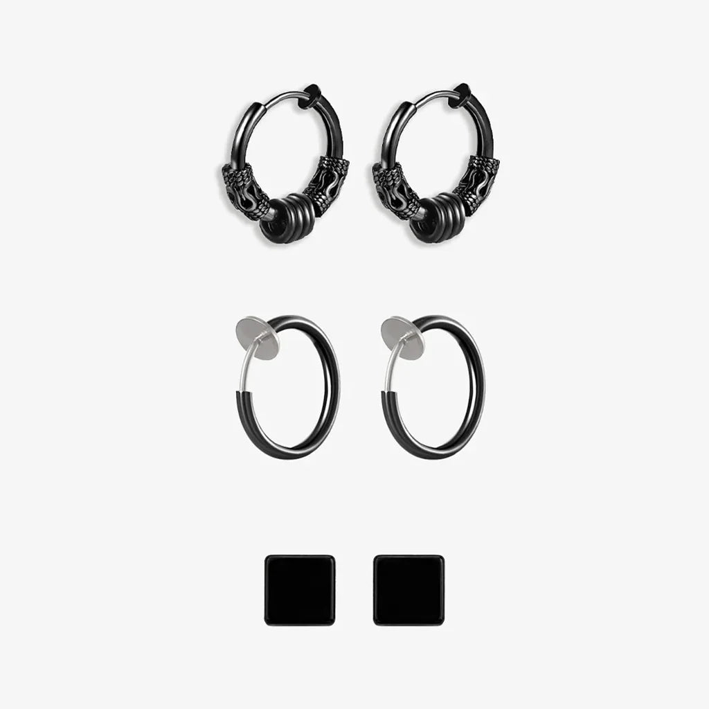 A set of black clip-on earrings in various designs, including hoop earrings and magnetic ear studs, displayed against a white background.